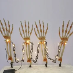 Celebrations Halloween Warm White 18 in. LED Prelit Chained Skeleton Arms Pathway Decor